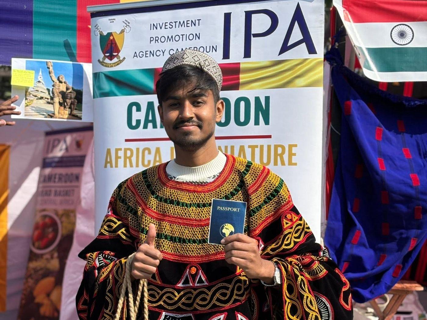 Global Village-এ Cameroon-এর স্টলে ঐতিহ্যবাহী পোশাক পরে মৃণাল দাস