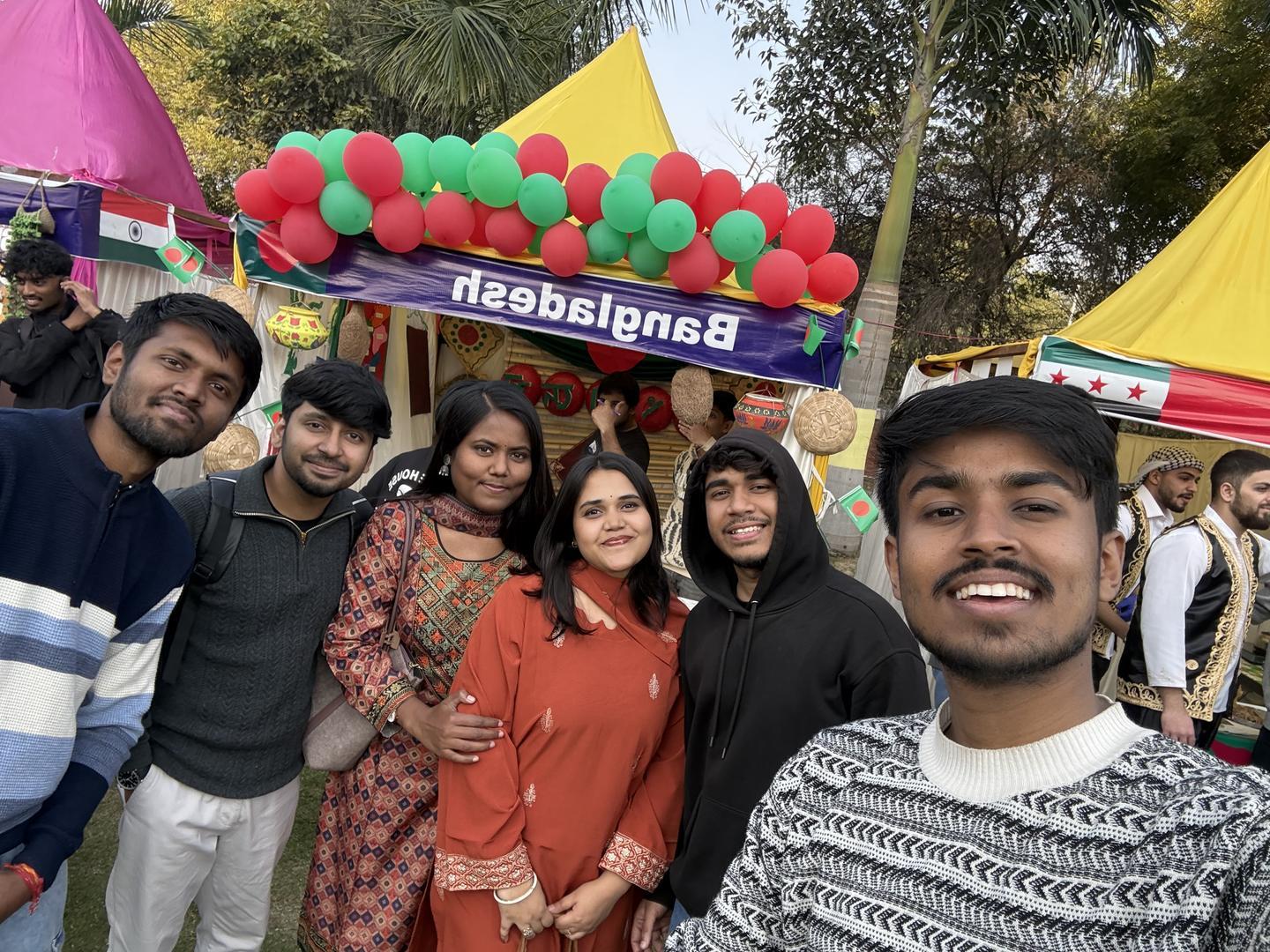 Bangladesh স্টলের সামনে বন্ধুদের সাথে মৃণাল দাসের সেলফি